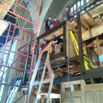 One of the upper back case frames is sent up  /Dobson Pipe Organ Builders