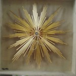 The zimbelstern star, which is about 18" in diameter and gilded, traveled in its own custom-made box. The string is to assist with handling  /Dobson Pipe Organ Builders