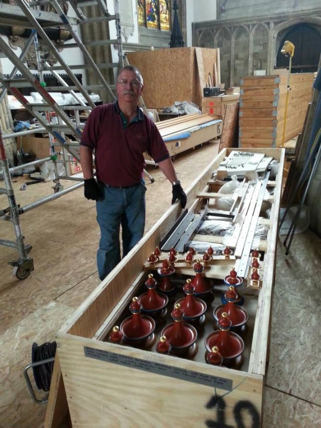 Bob Savage uncrates a collection of turnings, baubles, doodads, gewgaws, trinkets, knick-knacks and gimcracks /Dobson Pipe Organ Builders